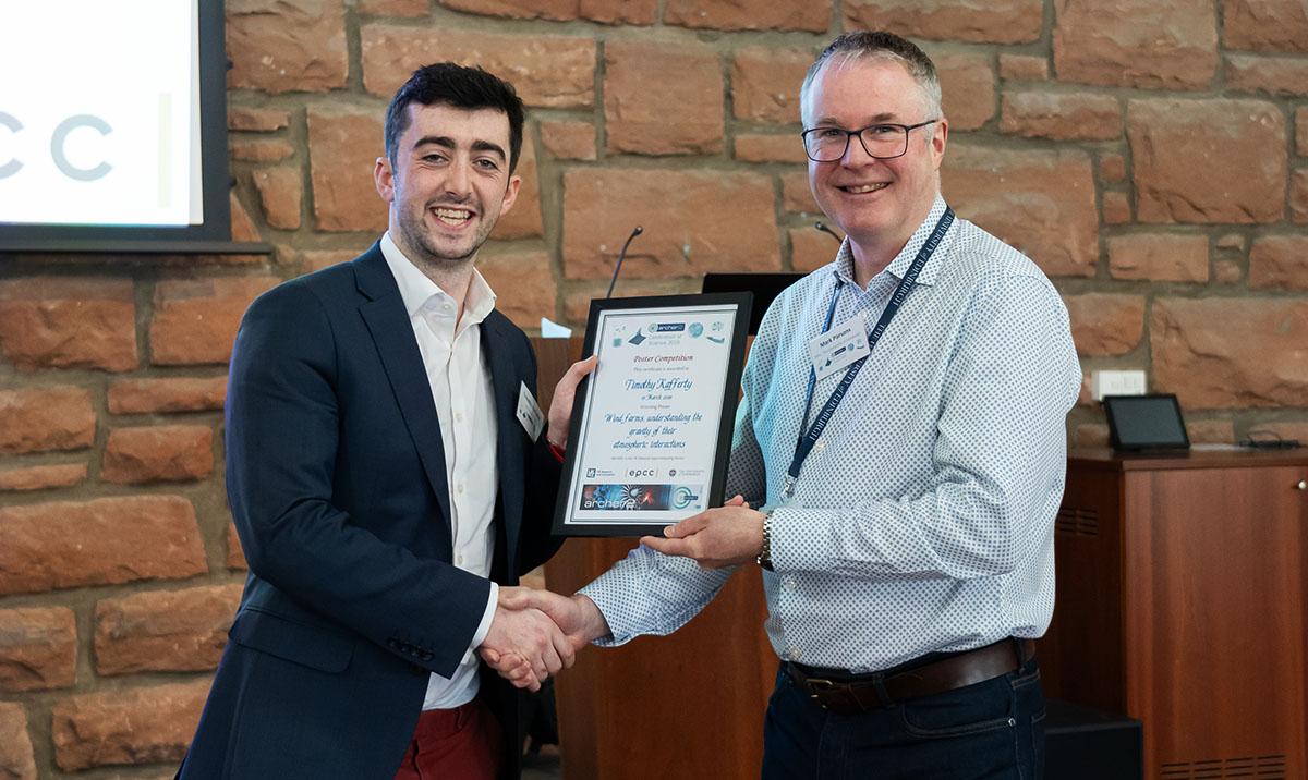 Winner of poster competition receives certificate