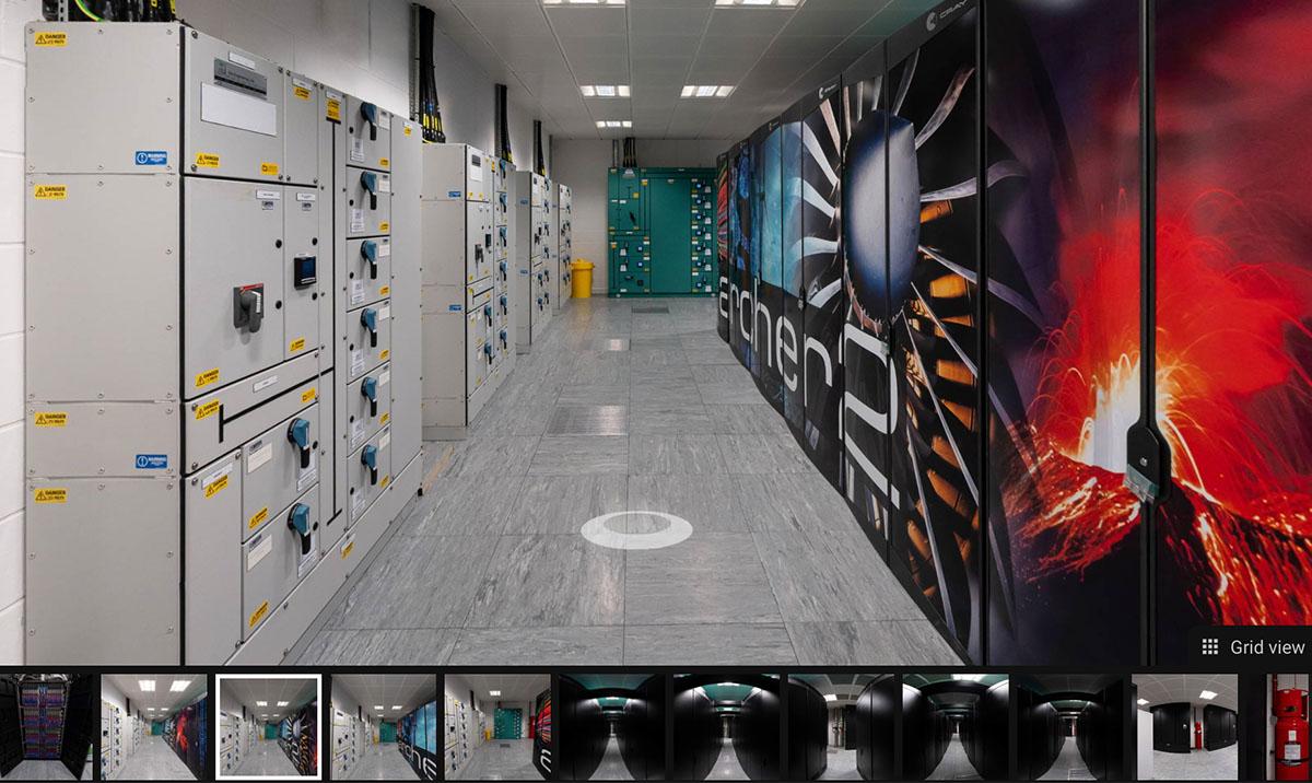 Photo shows a view along the side of the ARCHER2 system at the Advanced Computing Facility