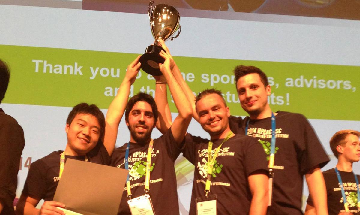 MSc students holding cup