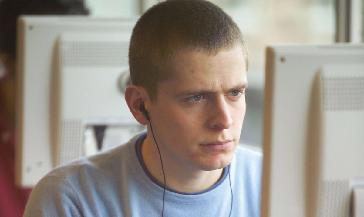 male student at computer