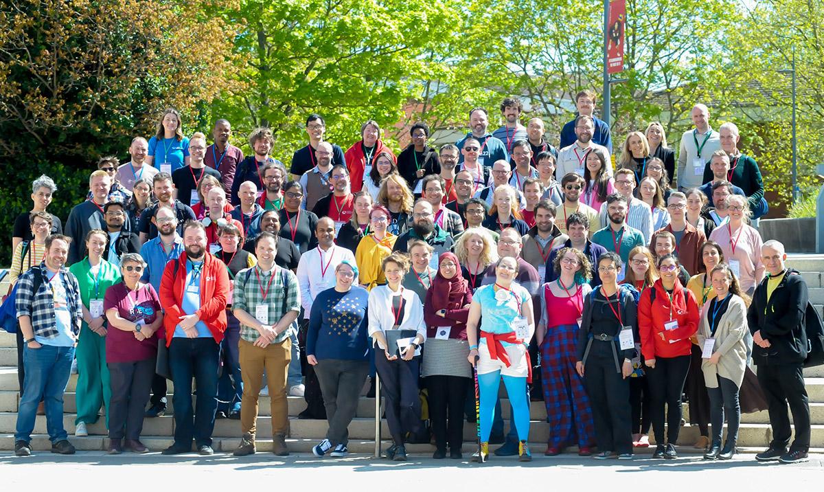 SSI Collaborations Workshop 2024: group photo taken in sunshine.