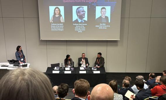 Photo shows a panel discussion on stage at Futurescot event